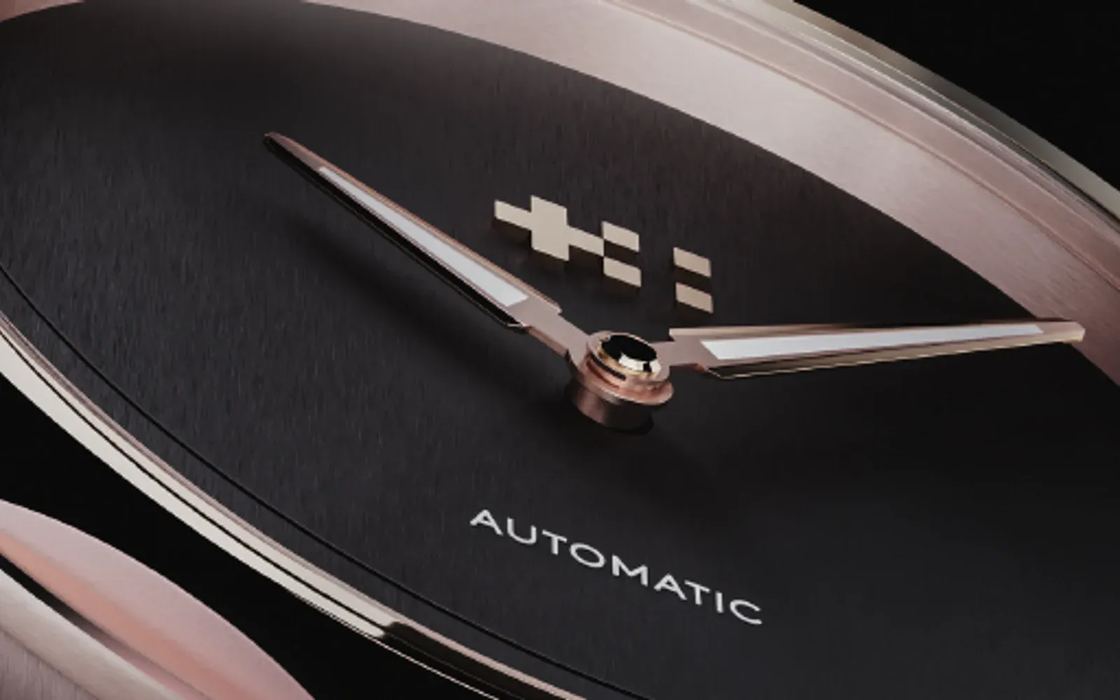 Pembe altın bezelli ve indekssiz siyah kadranlı Christopher Ward The Twelve Halo